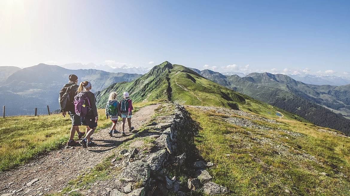 Hiking on a family holiday in Saalbach Hinterglemm in summer