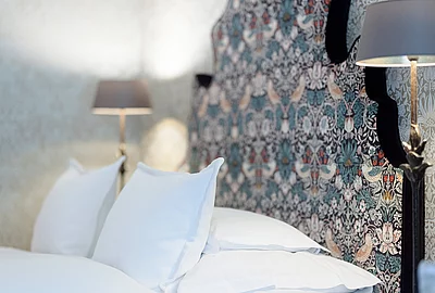 Double bed in the Deluxe family suite in the Hotel Unterschwarzachhof