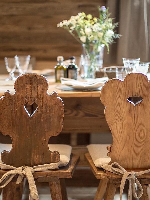 Tables and chairs in the Alpine inn, Landwirtschaft Hotel Unterschwarzachhof